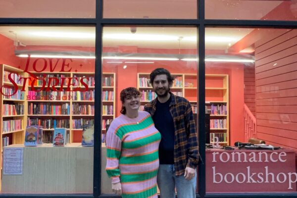 Aimee and Charlie Cummings outside Love Stories