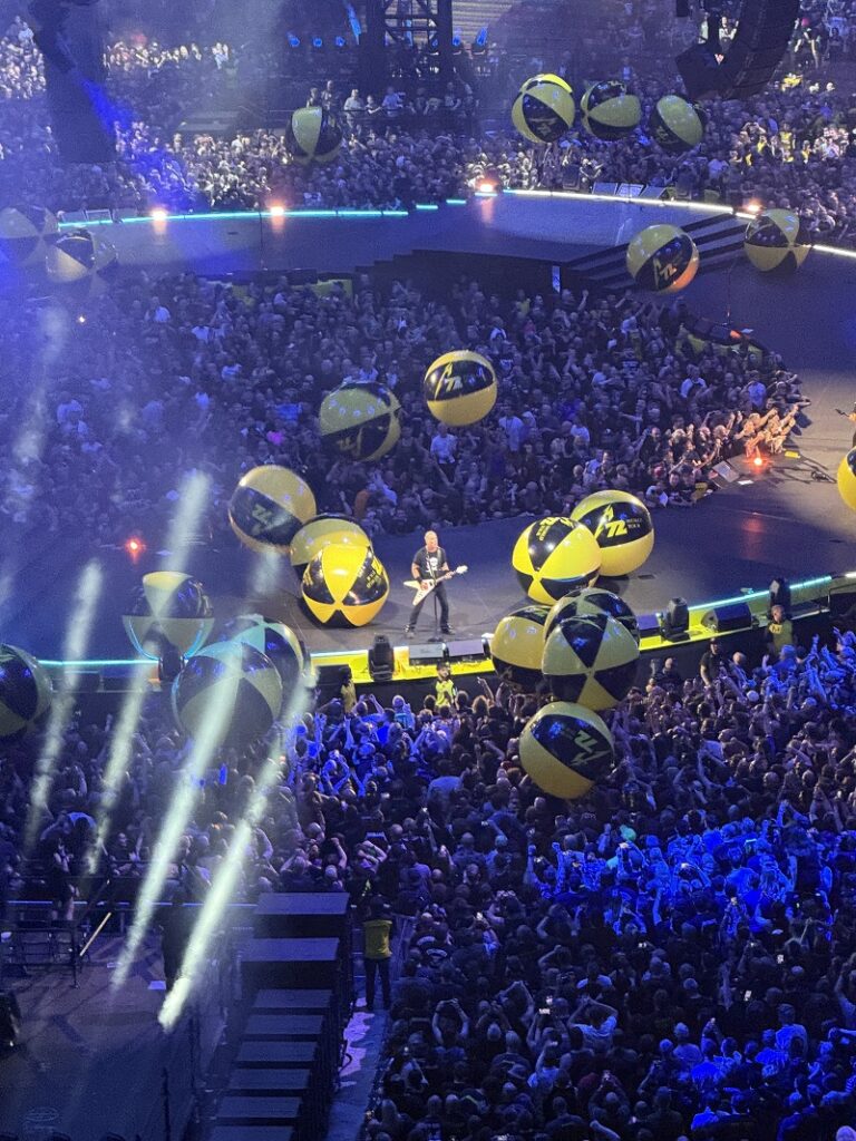James Hetfield faces an inflatable onslaught in Cardiff - credit Tim Alban