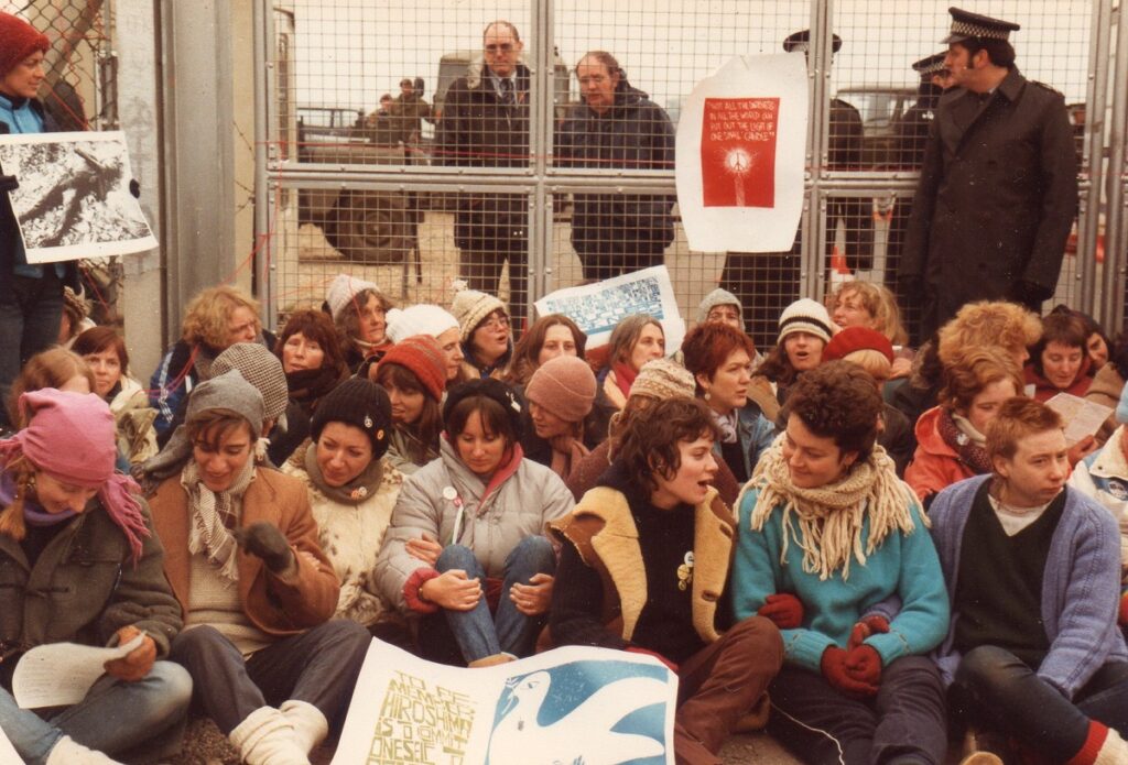 Women barricading a Greenham Common gate - credit Sandie Hicks & Greenham Women Everywhere