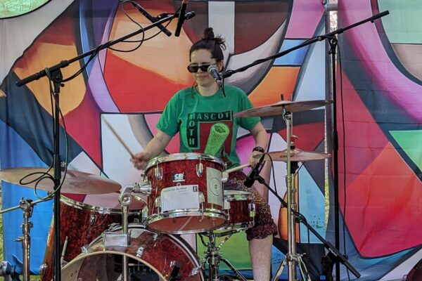 Sioned Camlin playing in Mascot Moth