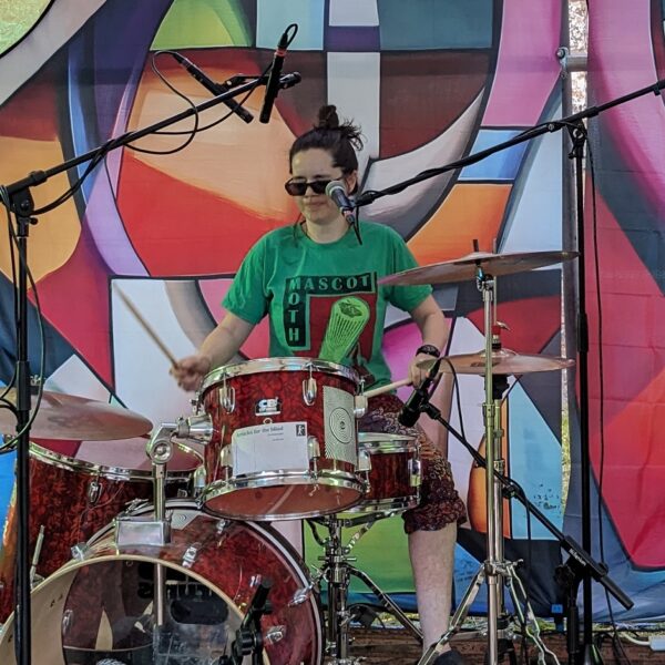 Sioned Camlin playing in Mascot Moth